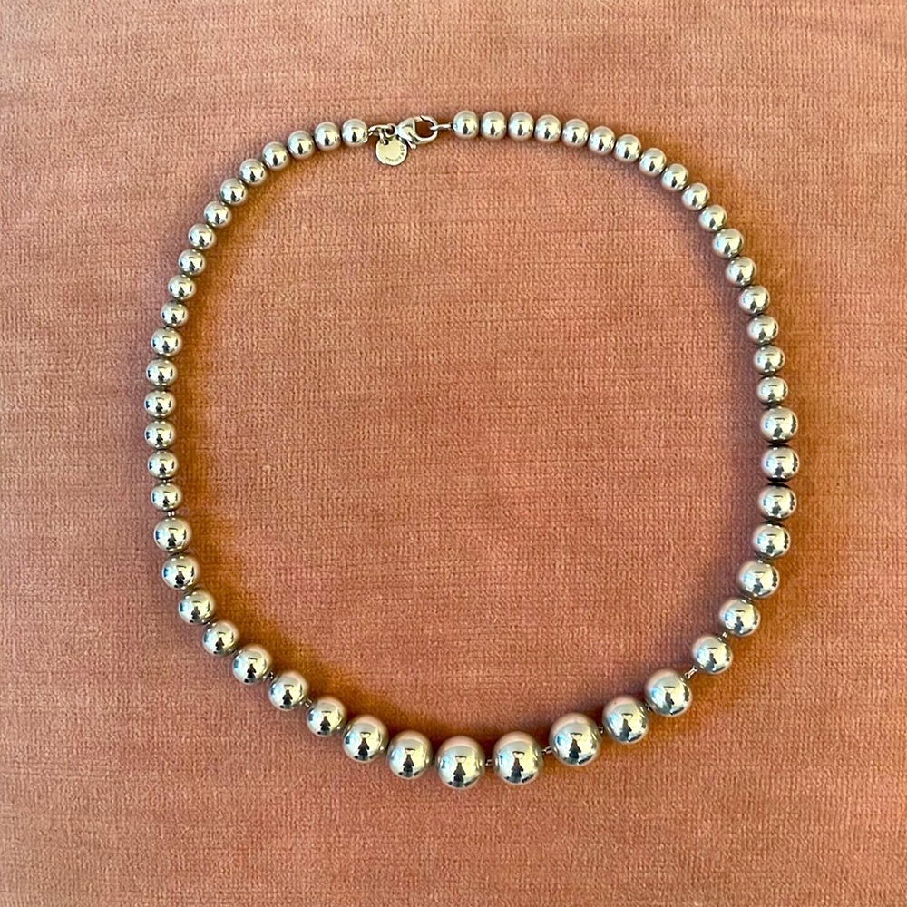 Authentic Tiffany 16” Sterling silver graduated ball necklace.